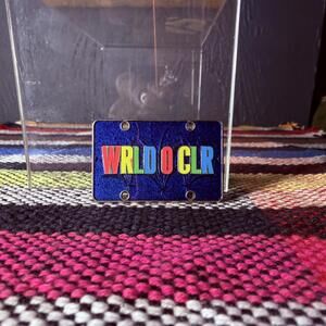 Disney DLR WRLD O CLR World of Color License Plate Mystery Pin PP91086